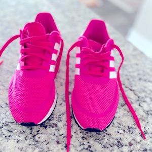 Unisex Adidas neon pink and white.